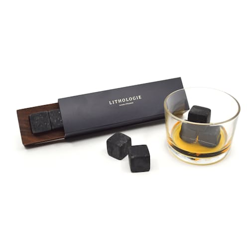 laydown image of Dark Granulite Hornblende Whiskey Stones with Tray