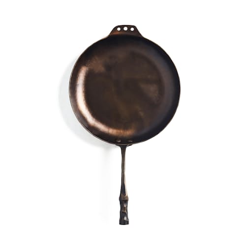 laydown image of Carbon Steel Farmhouse Skillet
