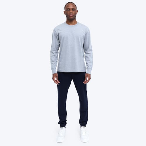 on model image of Midweight Terry Slim Sweatpant