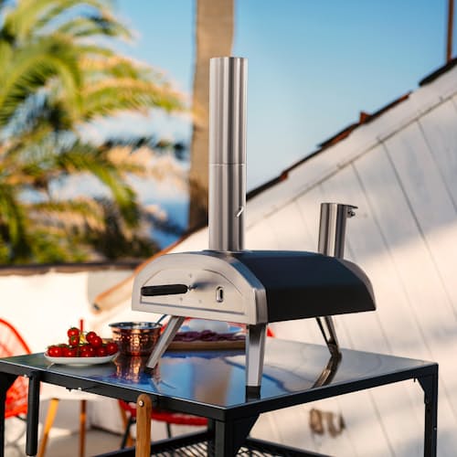 lifestyle image of Ooni Fyra 12 Wood Pellet Pizza Oven
