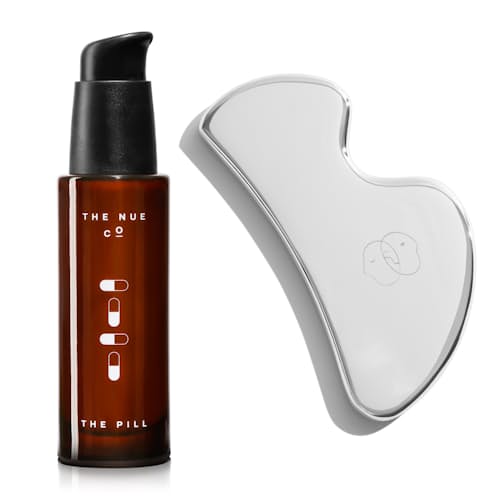 laydown image of The Pill + Gua Sha Tool Set