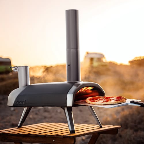 lifestyle image of Ooni Fyra 12 Wood Pellet Pizza Oven