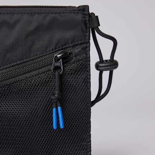 laydown image of Dan Lightweight - .5L Accessory Bag