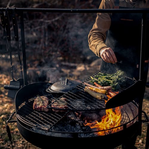 lifestyle image of Cowboy Firepit Grill - 30"
