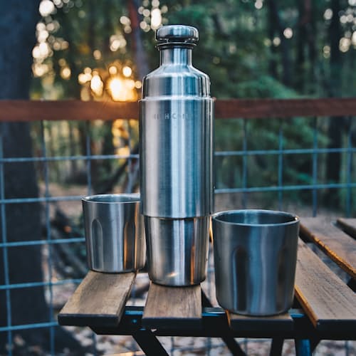 laydown image of Firelight 750ml Flask + Leather Holster
